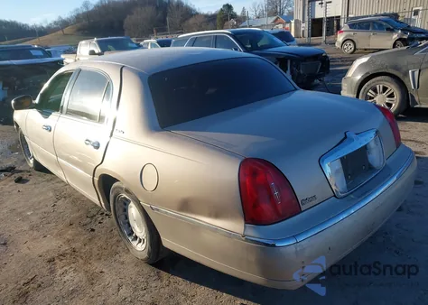 1998 Lincoln Town Car Executive из США, поврежденный, VIN 1LNFM81W9WY703375